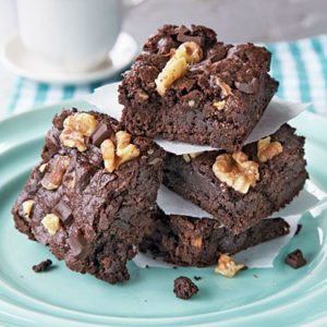 Walnut brownies on a blue plate